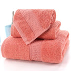 3-Piece Premium 100% Cotton Bath & Hand Towel Set in coral, featuring plush texture and decorative patterns.