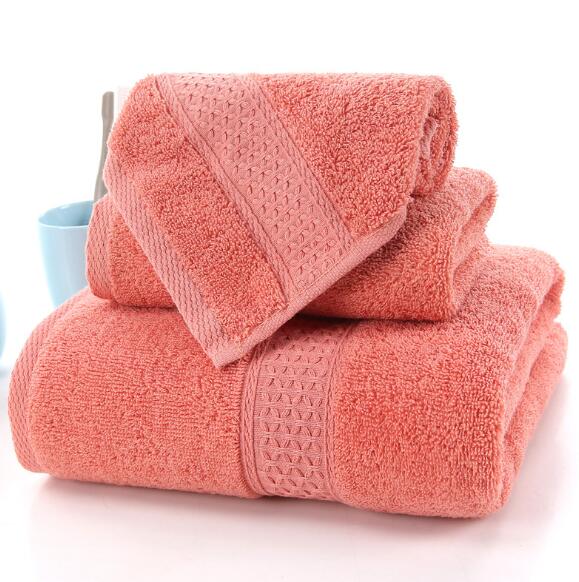 3-Piece Premium 100% Cotton Bath & Hand Towel Set in coral, featuring plush texture and decorative patterns.