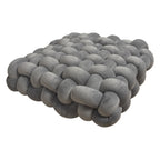 Square woven plush seat cushion in shades of gray, designed for sofas and bay windows, offering decorative comfort.