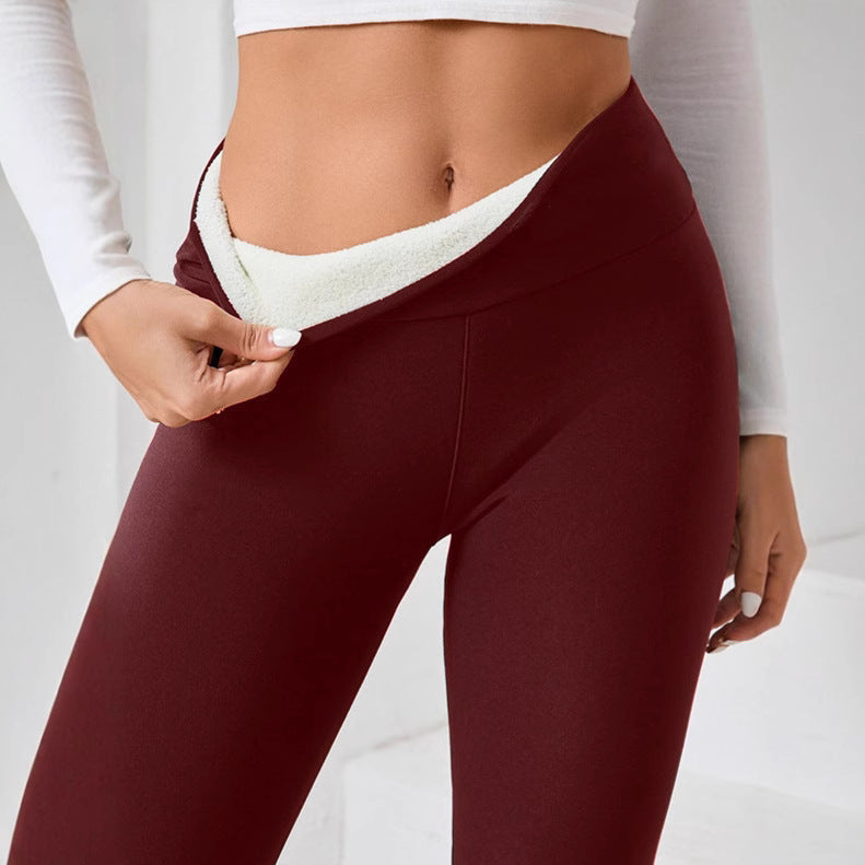 Women’s High-Waisted Sherpa Fleece-Lined Winter Leggings in burgundy, featuring a soft fleece interior for warmth and comfort