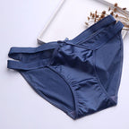 Satin Milk Silk girl underwear in navy blue, featuring a sexy hollow butterfly knot design and seamless, low-waist triangle c
