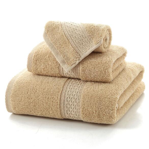 3-Piece Premium 100% Cotton Bath & Hand Towel Set in a soft beige color with textured patterns and plush design.