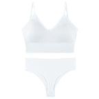 White gathered bra and matching thong set with thin triangle cups and adjustable straps, designed for comfort and style.