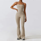 Beige bell bottoms gym set for women, featuring a one-piece yoga suit with flare leggings and a fitted bodice.