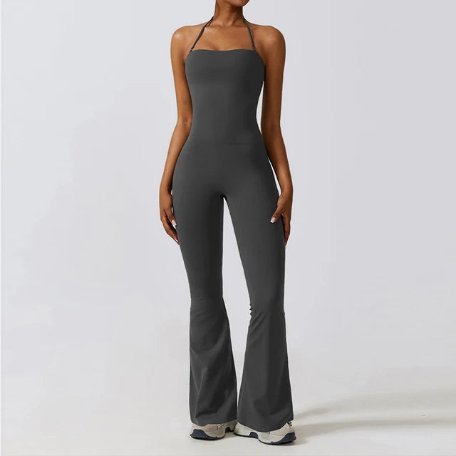 Gray bell bottoms gym set for women, featuring a one-piece yoga suit with flare leggings and a fitted bodice.