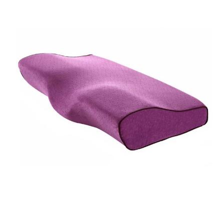 Purple cervical pillow with a contoured design for ergonomic support, ideal for neck and spine alignment.