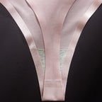 Pink transparent ice silk low waist G-string briefs with seamless design, featuring a minimalistic cut and soft fabric.