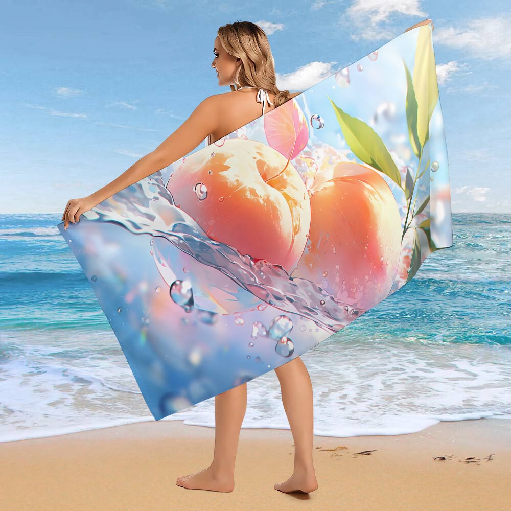 Plus Size Microfiber Beach Towel by classyfashionz, oversized 63"x32", featuring a vibrant peach design against a beach backd