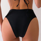 Solid Color Sexy Bikini in black, featuring a pleated low waist and triangle design, showcasing a high-cut style.