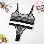Sexy Women's Mesh Printed Underwear Bra Sex Set featuring a sheer black bra and matching thong, surrounded by flowers and mag