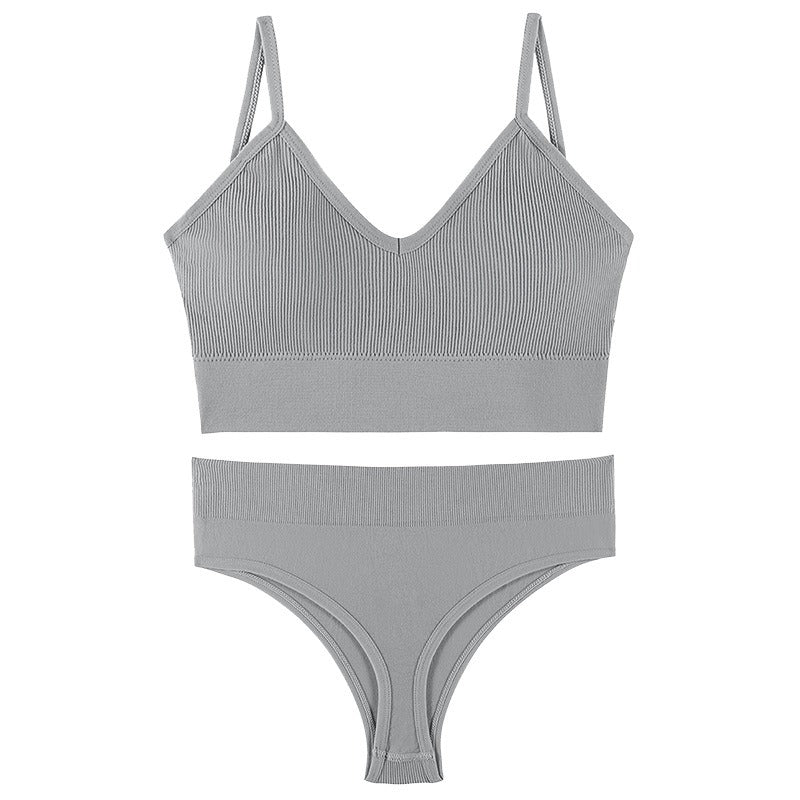 Gray gathered bra and matching underwear set with thin triangle cups and a sporty design, perfect for comfort and style.