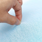Orthopedic Memory Foam Cool Gel Pillow with a hand pressing the soft, breathable fabric, showcasing its comfort and support f