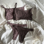 Knit Jacquard Camisole and Thong Two-Piece Set in brown tones, featuring floral and leopard patterns, displayed on white bedd