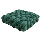 Square woven plush seat cushion in deep green, featuring a textured, padded design, ideal for sofas or bay windows.
