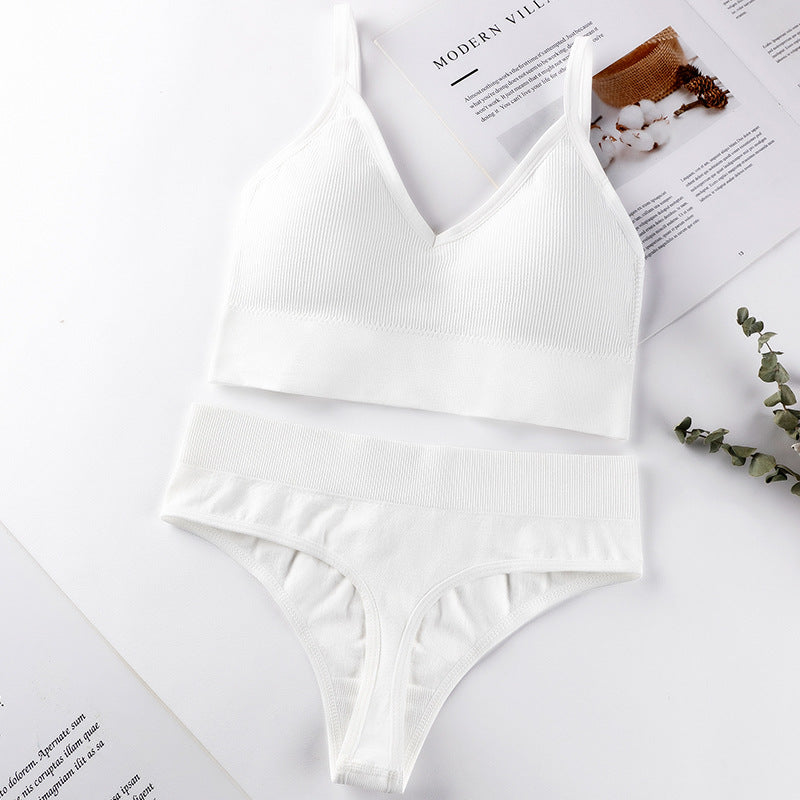 White seamless underwear set featuring a ribbed bralette and mid-waist thong, designed for comfort and breathability.