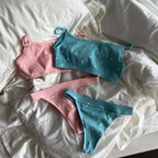 Knit Jacquard Camisole and Thong Two-Piece Set in pink and blue, featuring ribbed texture and floral patterns on soft fabric.