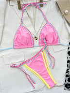 Back view of pink halter bikini set showing tie closure.