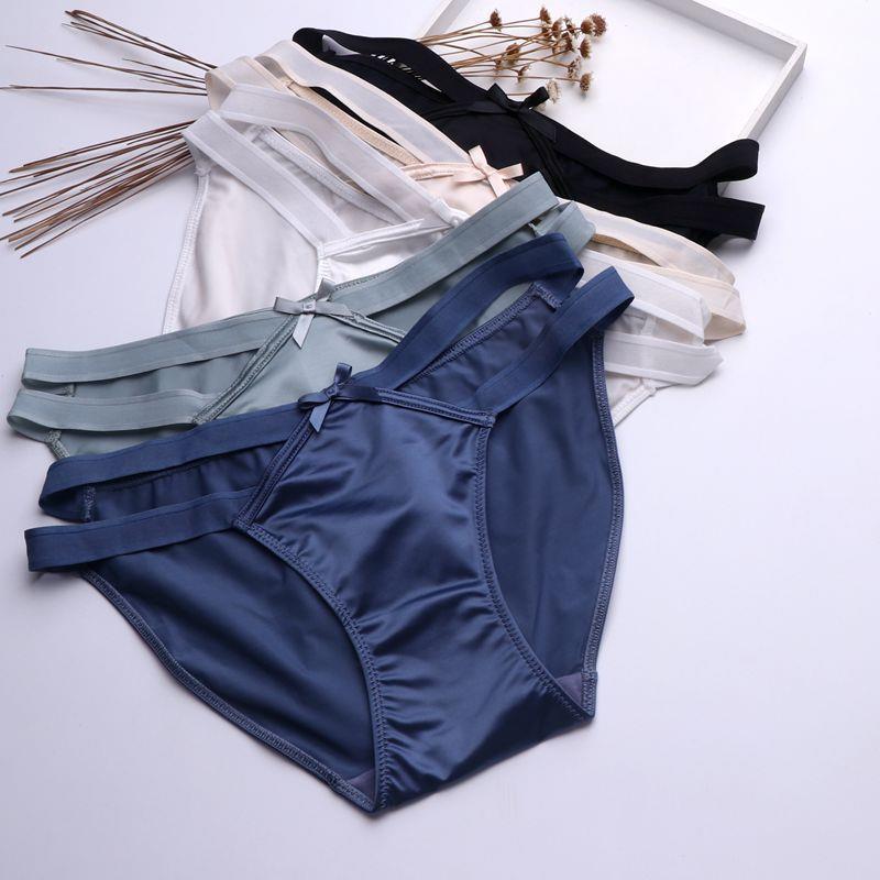 Set of satin milk silk girl underwear in various colors, featuring a sexy hollow butterfly knot design and seamless, low-wais