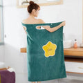 Wearable Coral Fleece Bath Towel Dress in teal with a yellow flower design, featuring shoulder cutouts and a button closure.