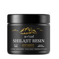 Open jar of premium Shilajit resin paste 50g showing dark mineral texture.