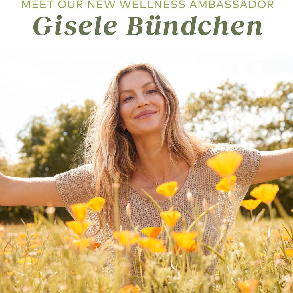 Hand holding daily dose of immune support oregano supplement.