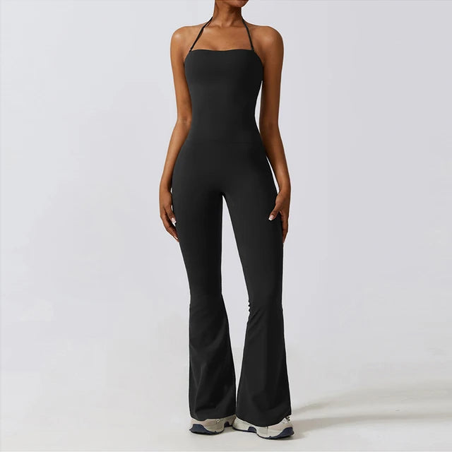 Black bell bottoms gym set for women, featuring a one-piece yoga suit with a fitted bodice and flared legs. Ideal for workout