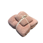 Ultra-Absorbent Coral Fleece Bath & Hand Towel Set in soft pink, featuring a textured pineapple grid design, tied with a ribb
