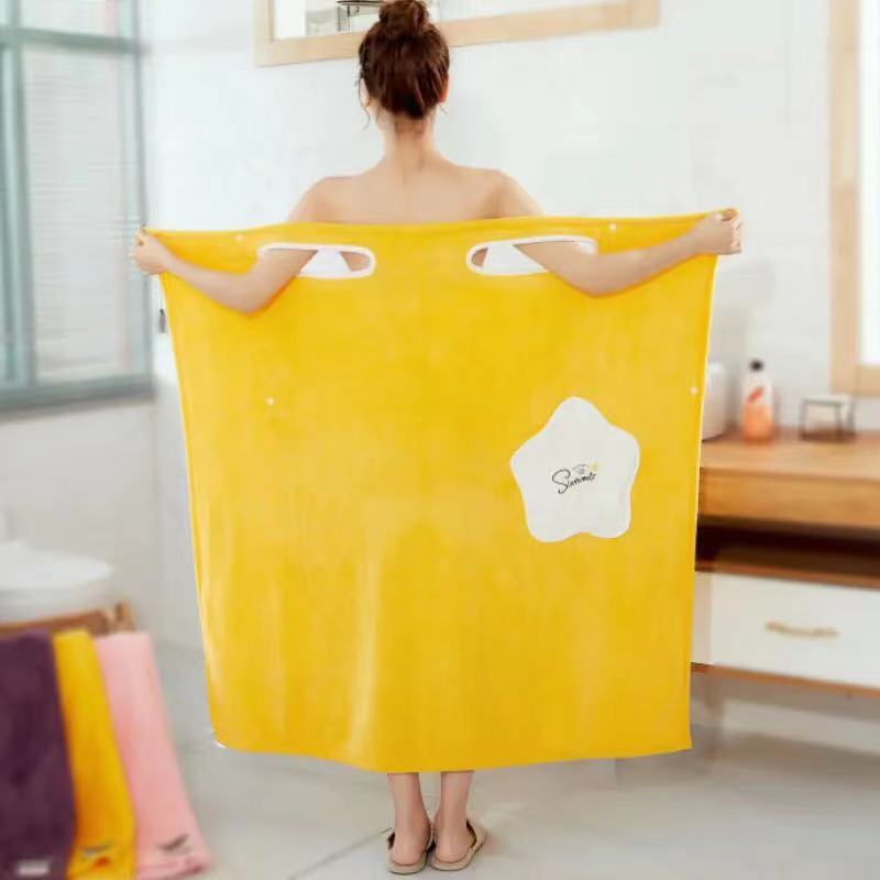Wearable Coral Fleece Bath Towel Dress in yellow, featuring a star-shaped logo, designed as an absorbent spa wrap.