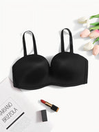 Black Women's Seamless Anti-Slip Gathered Comfort Bra with adjustable straps, displayed with tulips, lipstick, and magazine.
