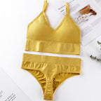 Yellow seamless underwear set featuring a ribbed bralette and mid-waist thong, designed for comfort and breathability.