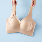 Woman wearing nude seamless wireless bra with side support.