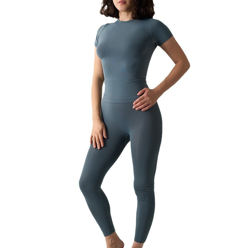 Seamless 2-Piece Activewear Set featuring a short sleeve sport t-shirt and long leggings in a stylish blue color.