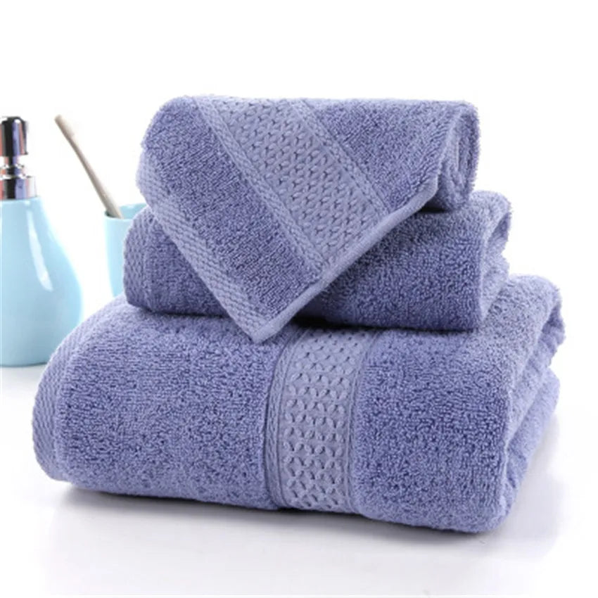 3-Piece Premium 100% Cotton Bath & Hand Towel Set in soft lavender, featuring a textured design and plush fabric.