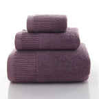 Premium 100% Cotton Thickened Bath Towel Set by classyfashionz, featuring three plush towels in a rich purple hue.