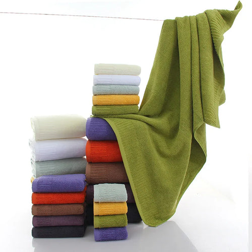 Premium 100% Cotton Thickened Bath Towel Set – 3-Piece Luxury Collection featuring stacked towels in various colors with a gr